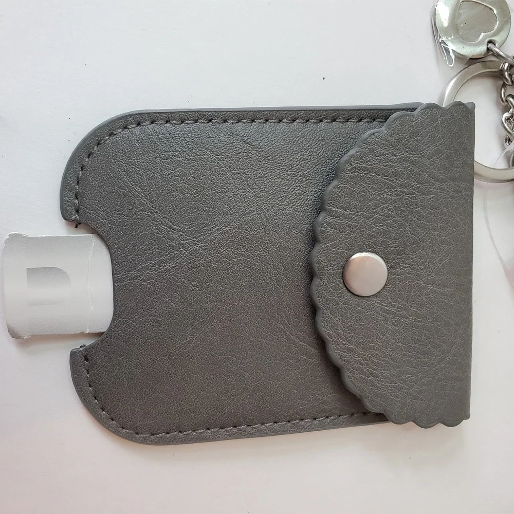 NWT Itzy Ritzy Cute N Clean Sanitizer Holder Charm Grey